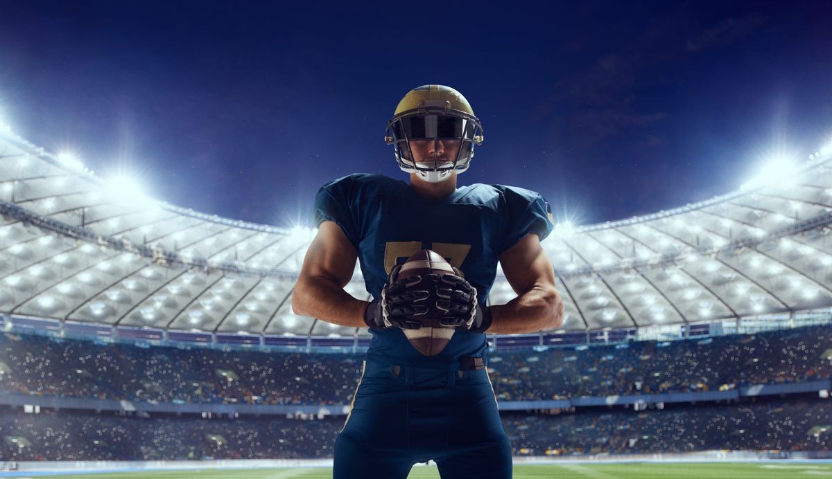 American football. American football player in professional sport arena.